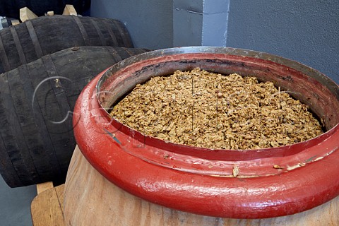 Grapeskin cap on amphora of fermenting Godello in winery of Mengoba The sherry butts are also used to age Godello San Juan de Carracedo Castilla y Len Spain  Bierzo