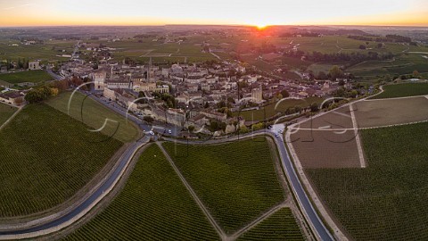 Dawn breaking over town of Saintmilion and its vineyards Gironde France Stmilion  Bordeaux
