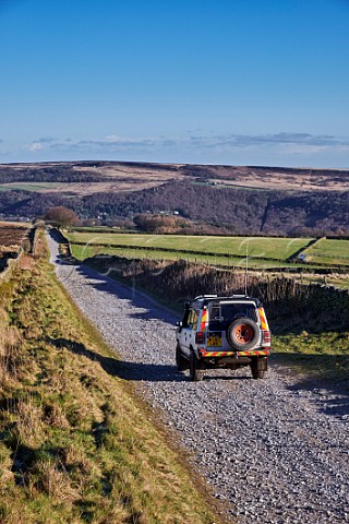 Land Rover on Sir William Hill Road Eyam Moor Peak District National Park Derbyshire England