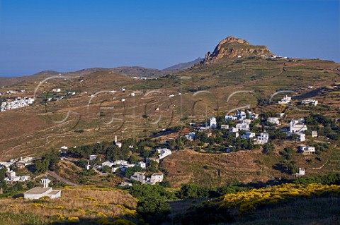 White villages of Mountados and Arnados with Mount Exomvourgo beyond Tinos Greece