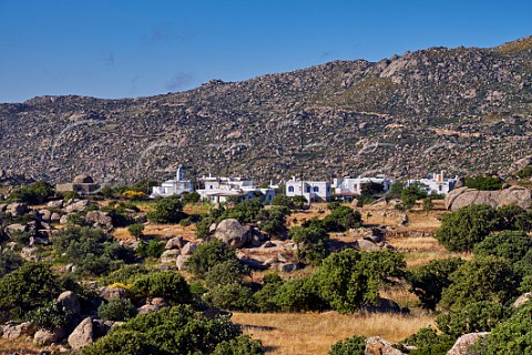 Volakas village surrounded by granite boulders on the Volax Plateau Tinos Greece