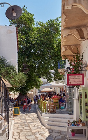 Tavernas on square in village of Pyrgos Tinos Greece