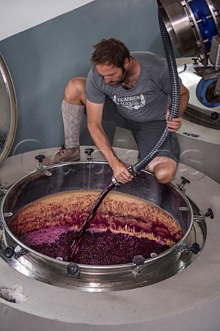 Eben Sadie pumping over his Grenache   whole bunches in a concrete fementer Sadie Family Wines Paardeberg Malmesbury South Africa Swartland