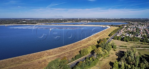 Europes largest floating solar farm  23000 photovoltaic panels  on Queen Elizabeth II Reservoir  Beyond are Knight and Bessborough Reservoirs with West Molesey on right  Walton on Thames Surrey UK