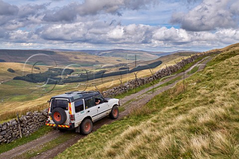 Car on Cam High Road near Hawes Yorkshire Dales National Park England