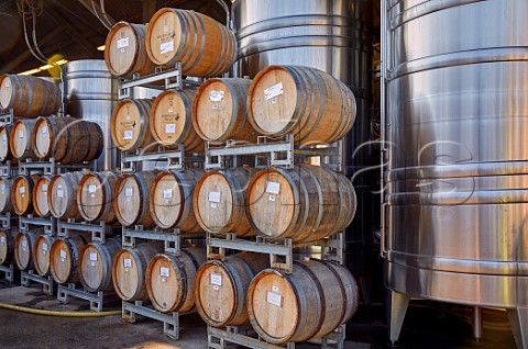 Oak barrels and stainless steel tanks at Hattingley Valley winery Lower Wield Hampshire England