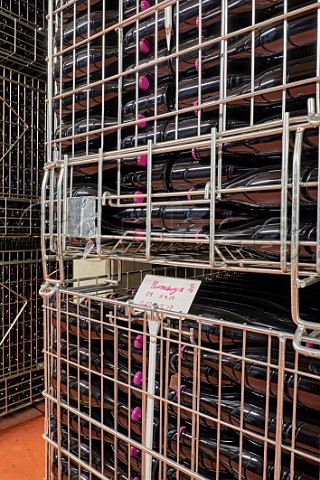 Bottles of Bloomsbury sparkling wine aging in the winery of Ridgeview Ditchling Common Sussex England