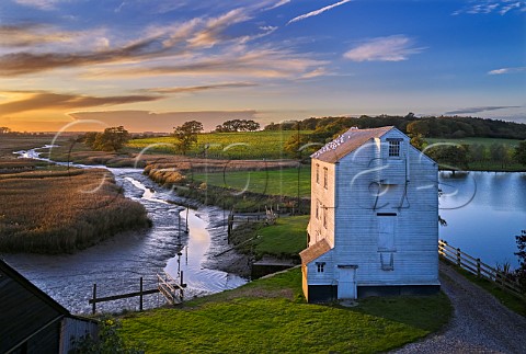 Thorrington Tide Mill on Alresford Creek a Grade 2 listed building built in 1831 Thorrington Mill Vineyard is beyond   Near Brightlingsea Essex UK