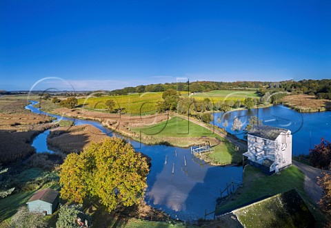 Thorrington Tide Mill on Alresford Creek a Grade 2 listed building built in 1831 Thorrington Mill Vineyard is beyond   Near Brightlingsea Essex UK