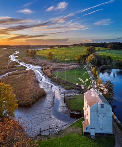 Thorrington Tide Mill on Alresford Creek a Grade 2 listed building built in 1831 Thorrington Mill Vineyard is beyond   Near Brightlingsea Essex UK