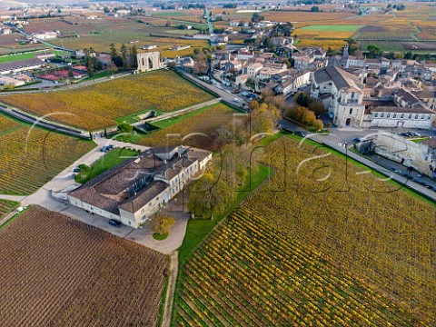 Chteau Clos Fourtet and its vineyards with vineyard of Les Grands Murailles beyond Stmilion Gironde France Saintmilion  Bordeaux