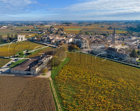 Chteau Clos Fourtet and its vineyards with vineyard of Les Grands Murailles beyond Stmilion Gironde France Saintmilion  Bordeaux