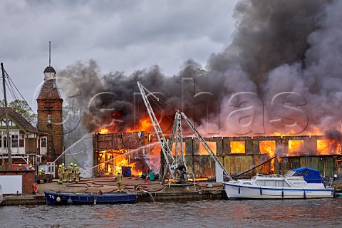 Fire brigade at the Platts Eyot fire of 3 May 2021 which destroyed the boat shed of Otter Marine and the Dunkirk evacuation ship Lady Gay The River Thames at Hampton Middlesex England