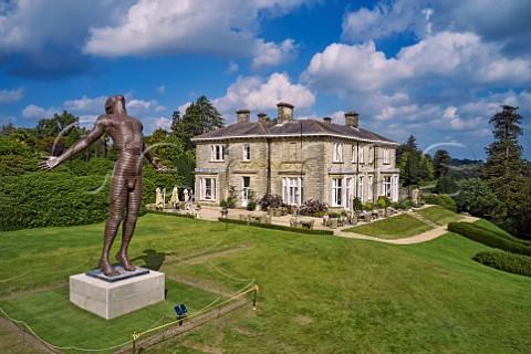 Leonardslee House and Faith sculpture by Anton Smit Lower Beeding Horsham Sussex England