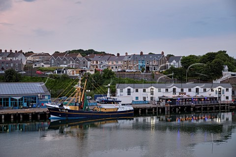 Fishing trawler moored at the quay of Milford Haven waterfront Pembrokeshire Wales