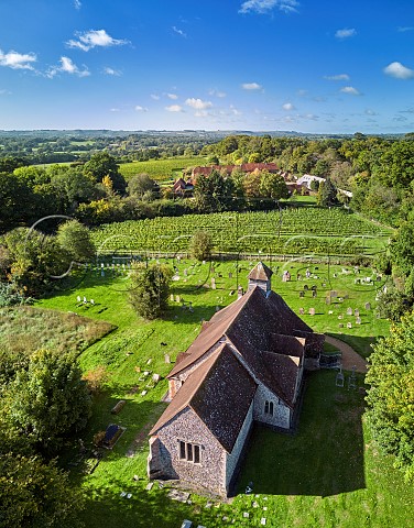 Church of St Michael and All Angels with All Angels Vineyard beyond Enborne Berkshire England