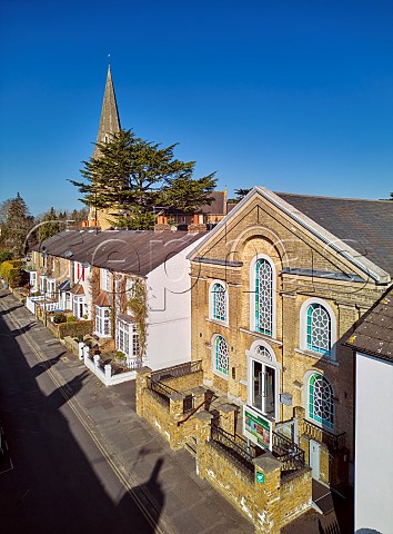 Esher Green Baptist Church with Christ Church beyond Park Road Esher Surrey England