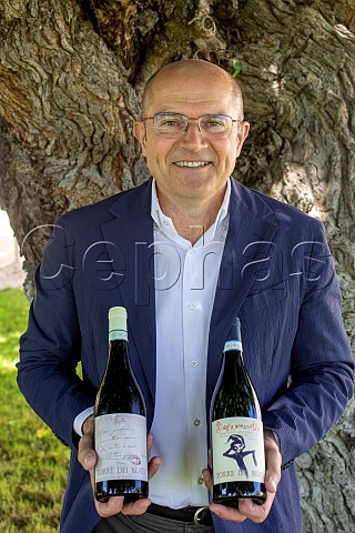 Fausto Albanesi of Torre dei Beati holding bottles of his Cerasuolo dAbruzzo and Montepulciano dAbruzzo Loreto Aprutino Abruzzo Italy