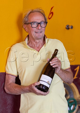 Walter Massa with bottle of his 2013 Costa del Vento cru Timorasso Vigneti Massa Monleale Piemonte Italy Colli Tortonesi
