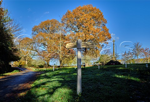 Signpost pointing to winery by the war memorial in Stopham Sussex England