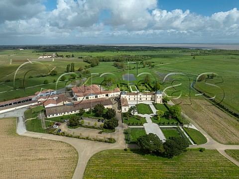 Chteau Calon Sgur and its vineyards with the Gironde Estuary in distance SaintEstphe Gironde France Mdoc  Bordeaux